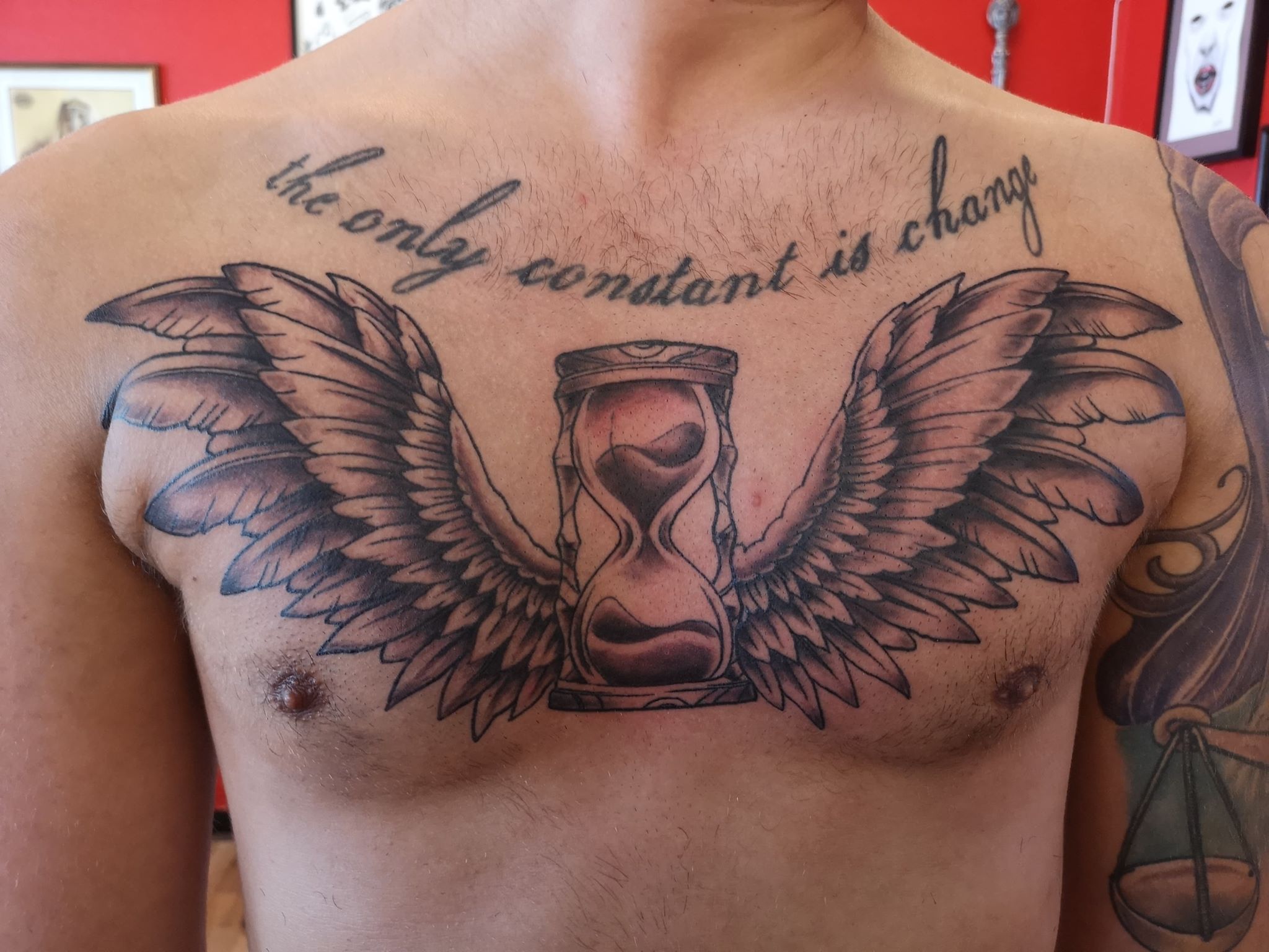 Chest tattoo/Wings and Hourglass